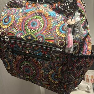 Sakroots Red and Pink Bohemian Backpack with Artistic Flair